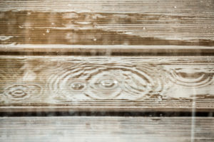 Berlin, attic, terrace, wooden planks with raindrops Berlin, attic, terrace, wooden planks with raindrops